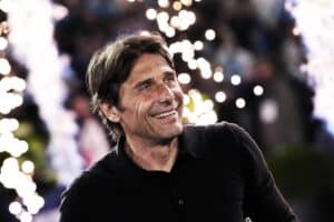 Conte sorride